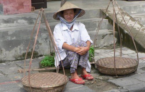 Woman with two baskets